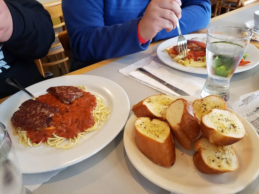 Italian Sausage over Spaghetti